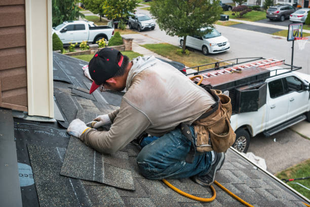 Professional Roofing technician working in Alma, CO